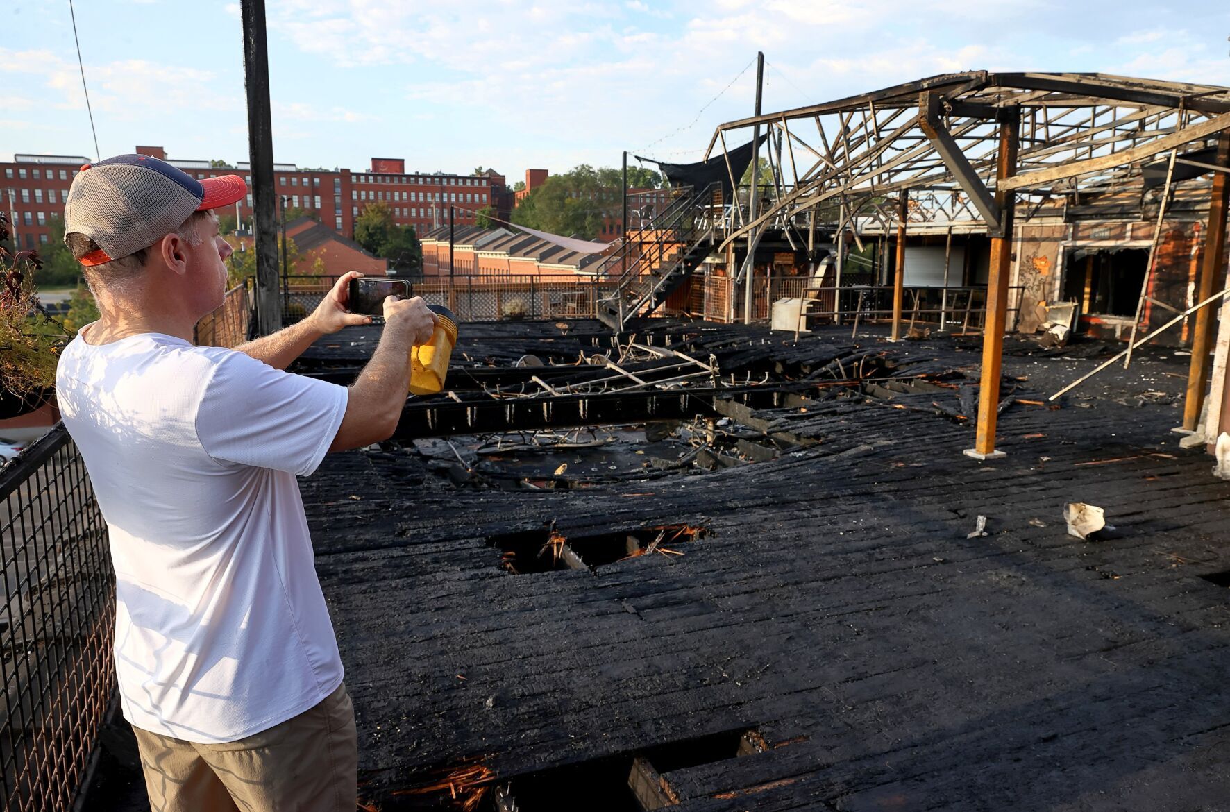 Fire on Vin de Set rooftop desk, water damages event space, PW Pizza below